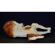 Statue in porcelain of a lying Borzoi